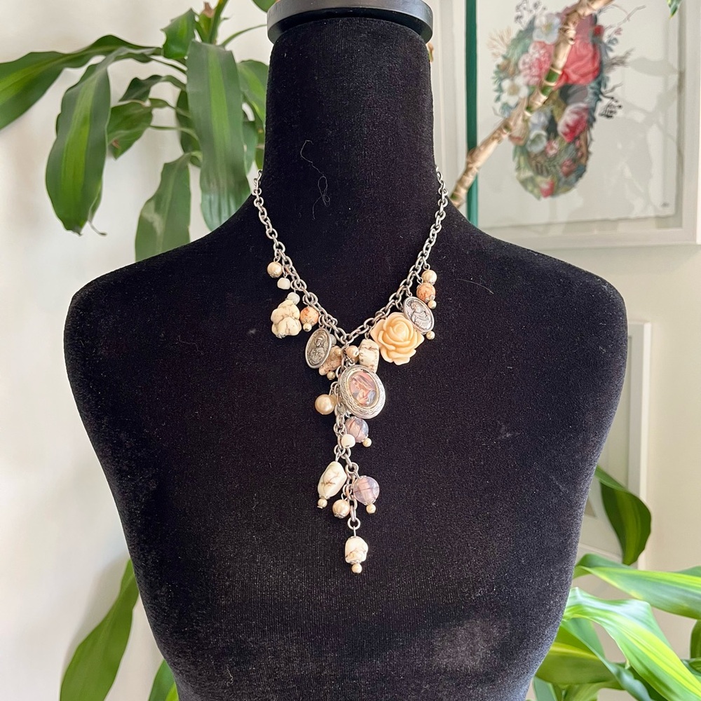 Silver and Cream Necklace with floral , stone and religious charms
